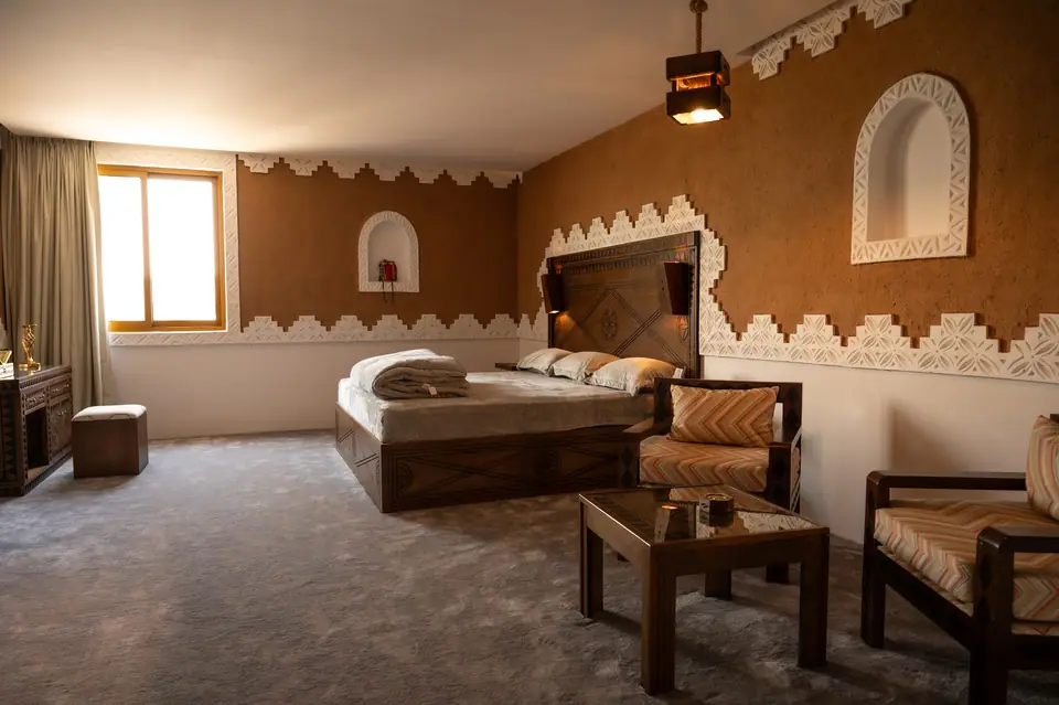 Master bedroom with seating area